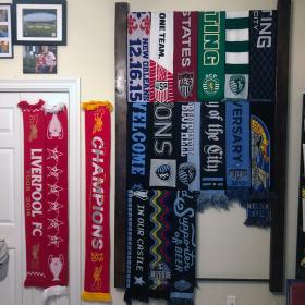Most of the scarves have been moved onto the rack, with a little room left over for the full-hanging one.